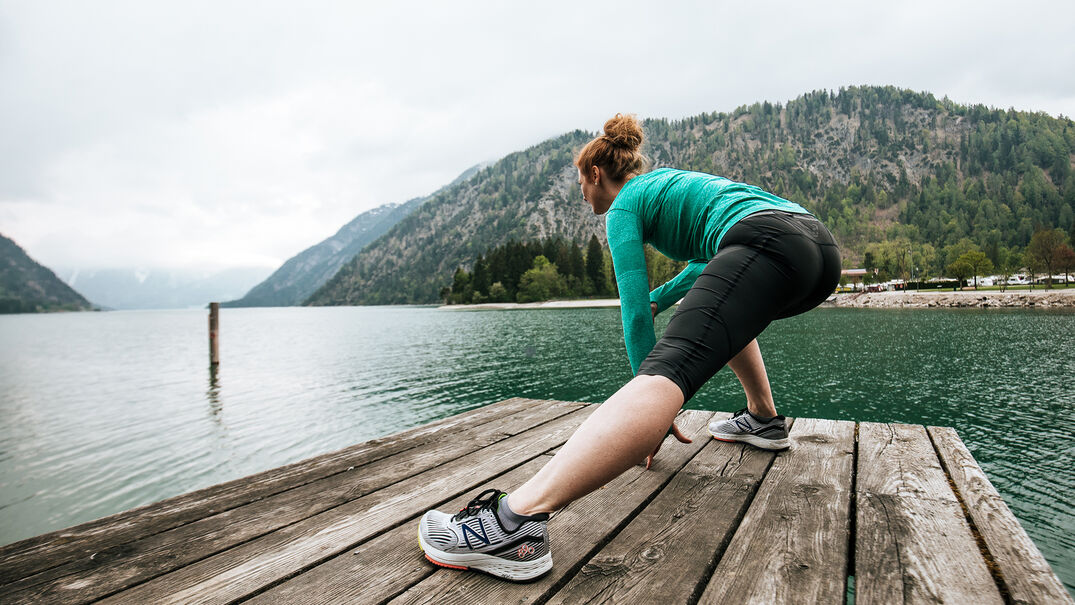 Do stretching exercises & enjoy the view of the lake & Alpen Caravan Park.