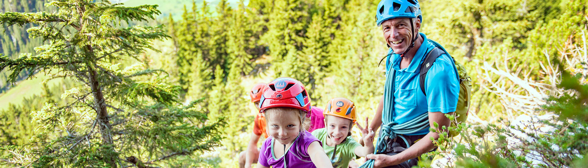 The Felix and Charlotte family-friendly via ferrata in the Rofan mountains at Lake Achensee is a family adventure to remember.