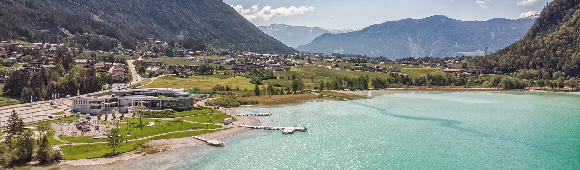 Aerial view of the Atoll Achensee in brilliant sunshine.