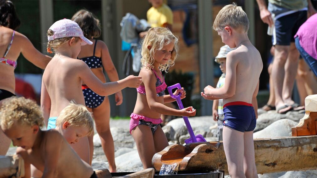 Children clearly enjoy themselves at the playground by the lake in Achenkirch.