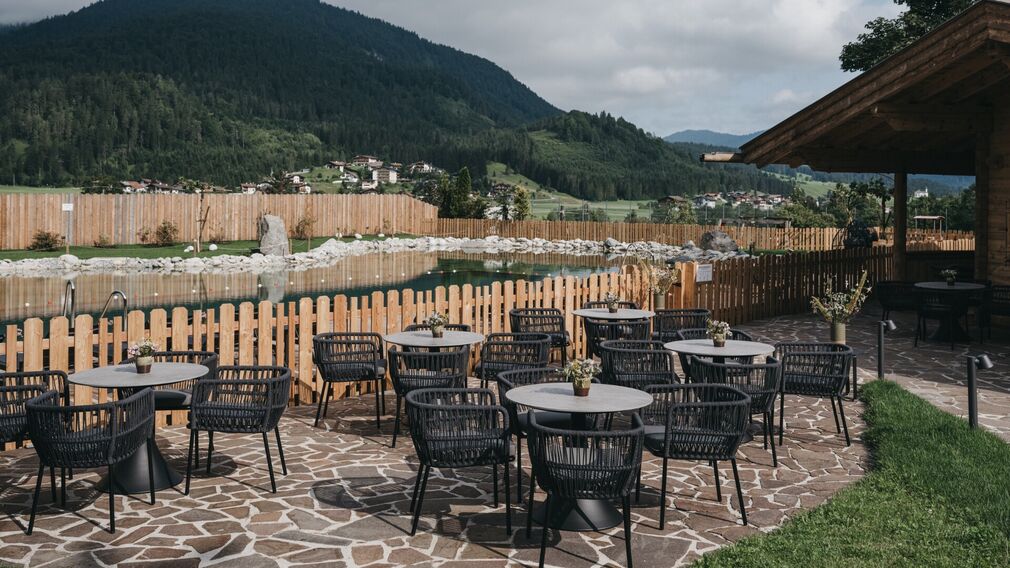 inside the Tirolerhütte – a laid table beside the open fire