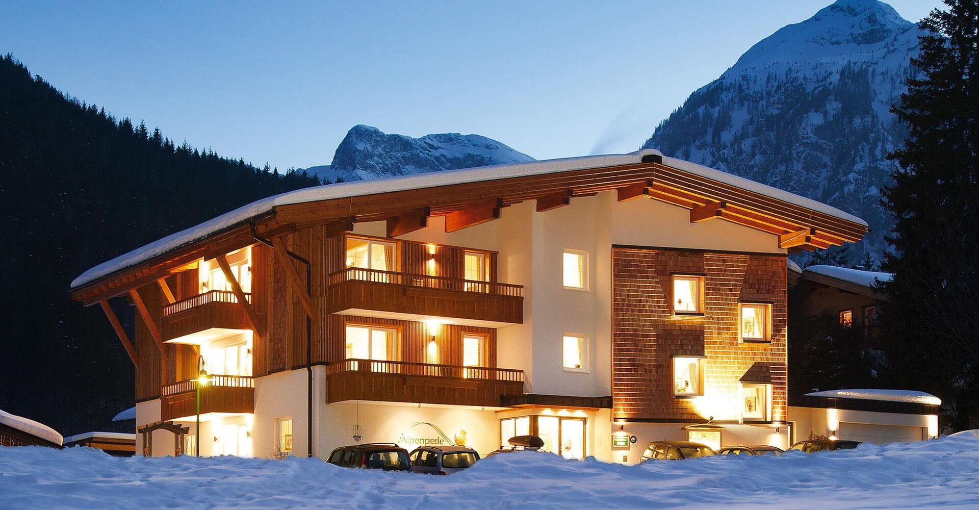 Apart Garni Alpenperle - Hausansicht im Winter