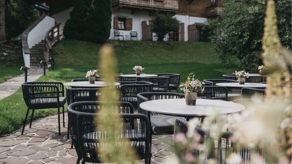 inside the Tirolerhütte – a laid table beside the open fire