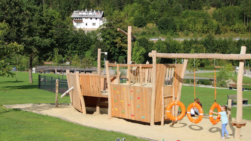 Children clearly enjoy themselves at the playground by the lake in Achenkirch.
