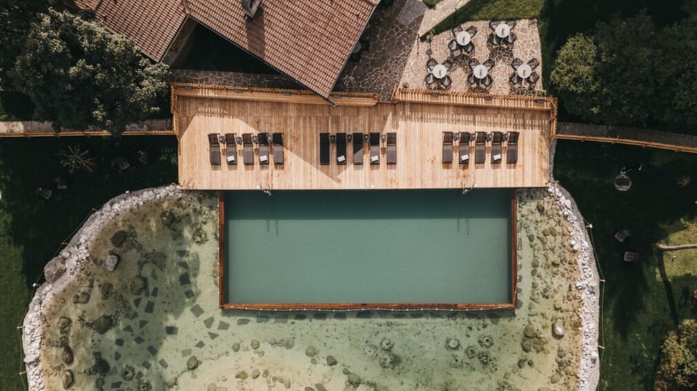inside the Tirolerhütte – a laid table beside the open fire