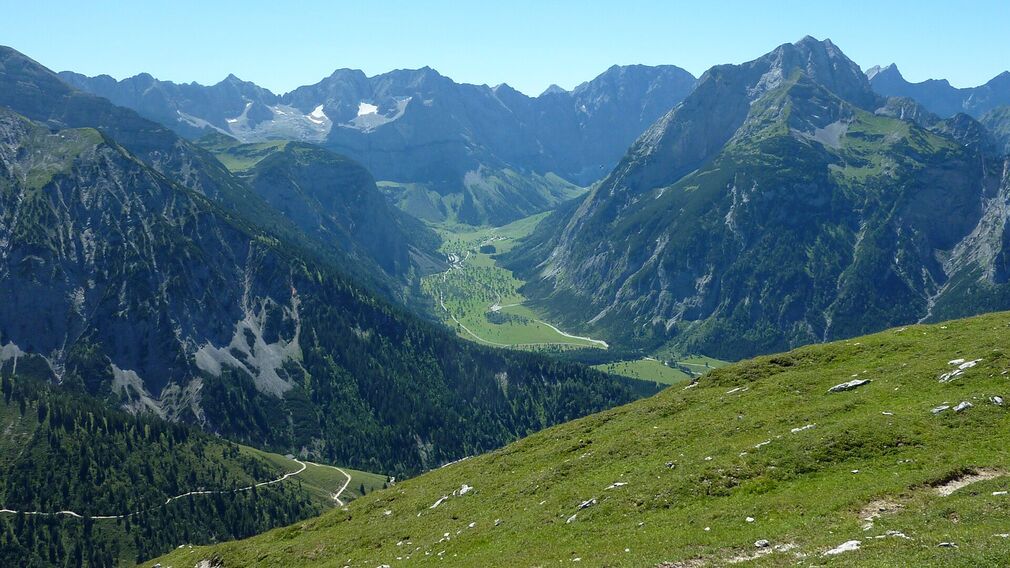 view from the 1,935 metre-high summit of the Satteljoch towards Lake Achensee and the Plumsjochhütte mountain hut