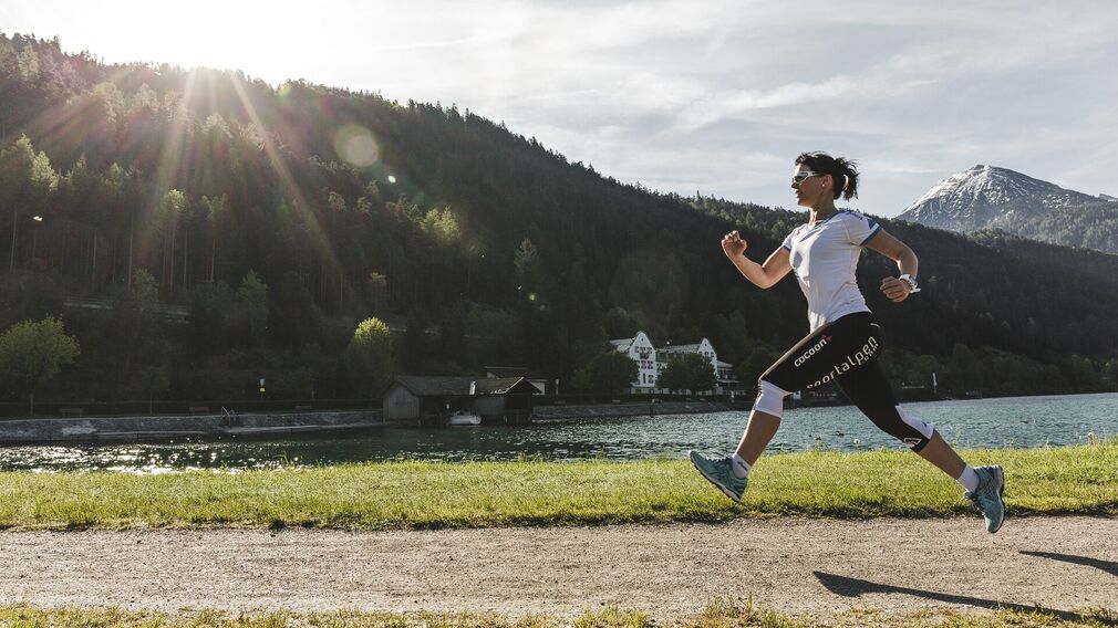 running along the lake promenade in Pertisau