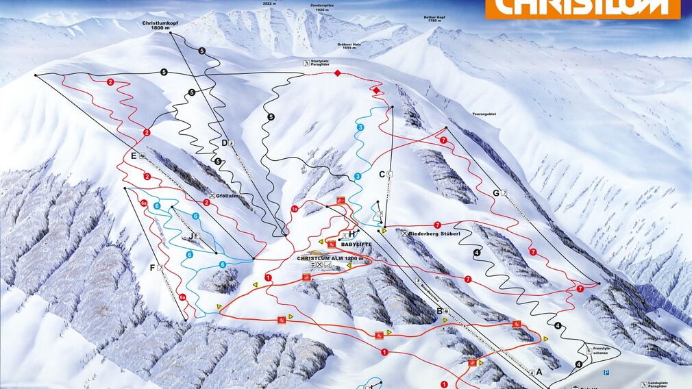 Winterliche Aufnahme vom Dorf Achenkirch am Achensee mit Blick auf das Skigebiet Hochalmlifte Christlum.
